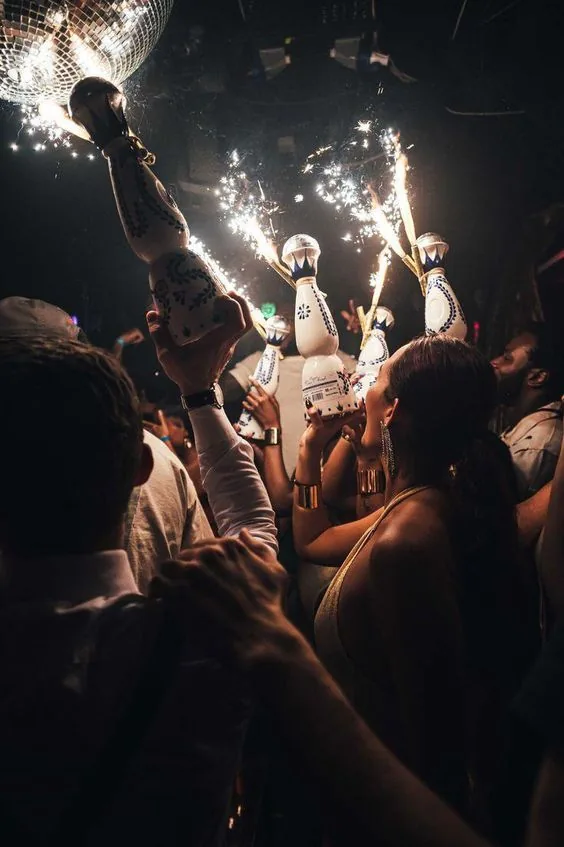 Champagne service at an evening celebration
