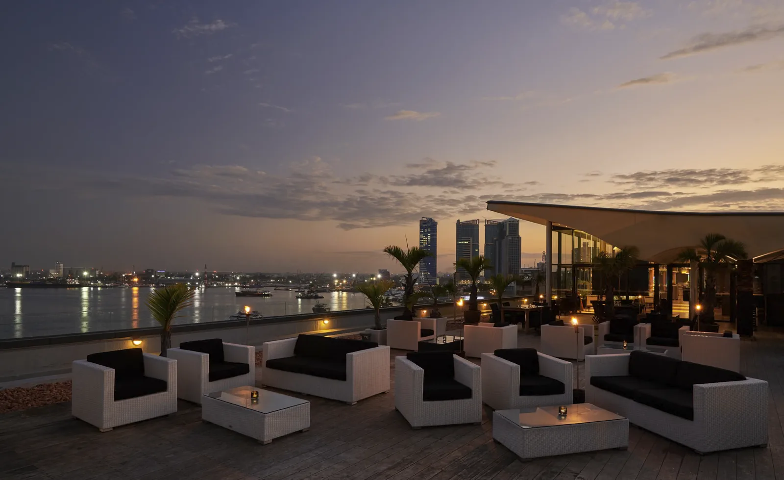 Sunset views from Level 8 Rooftop Bar over the Dar es Salaam skyline