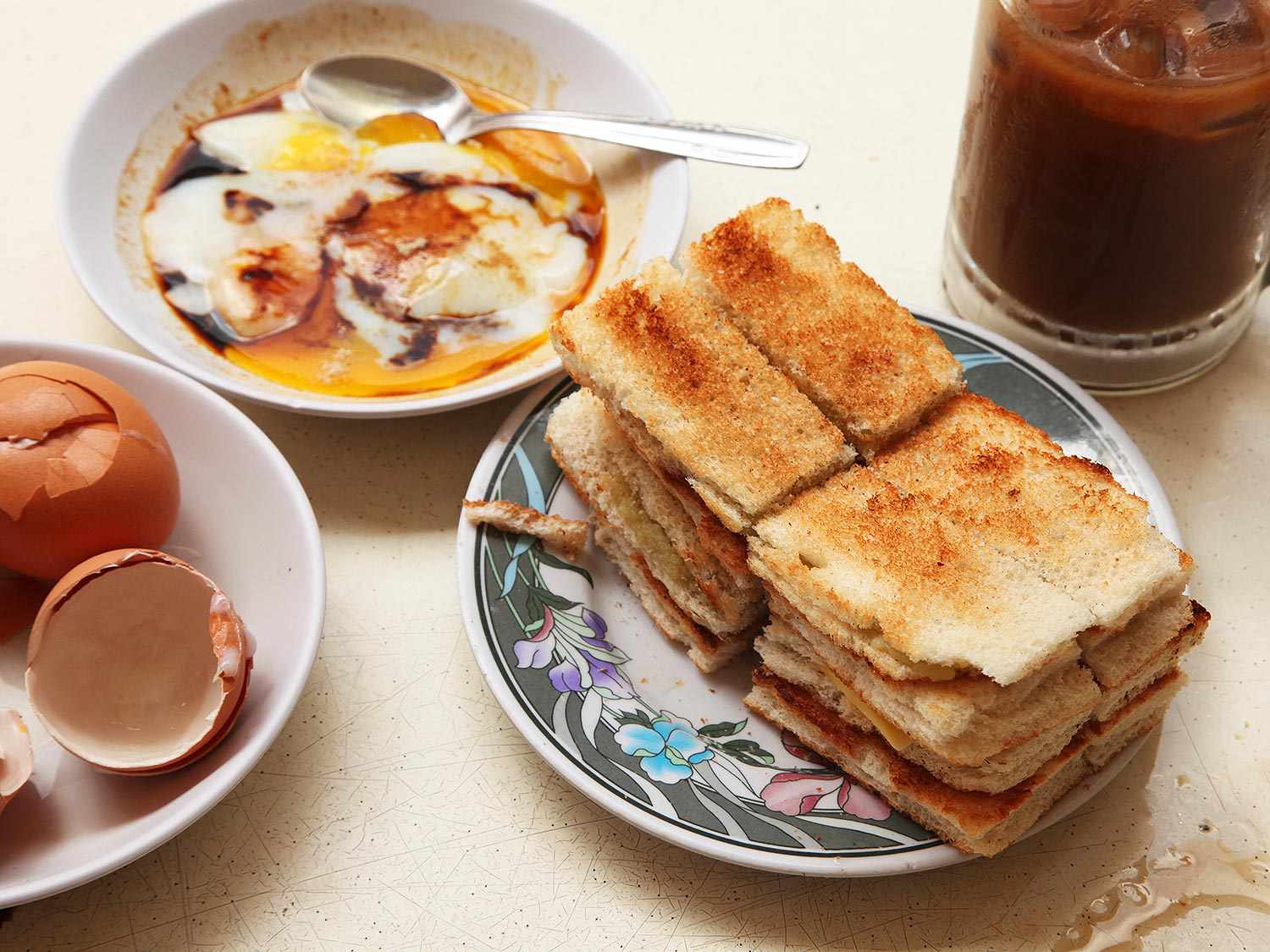 The classic set: kaya toast, soft-boiled eggs and kopi