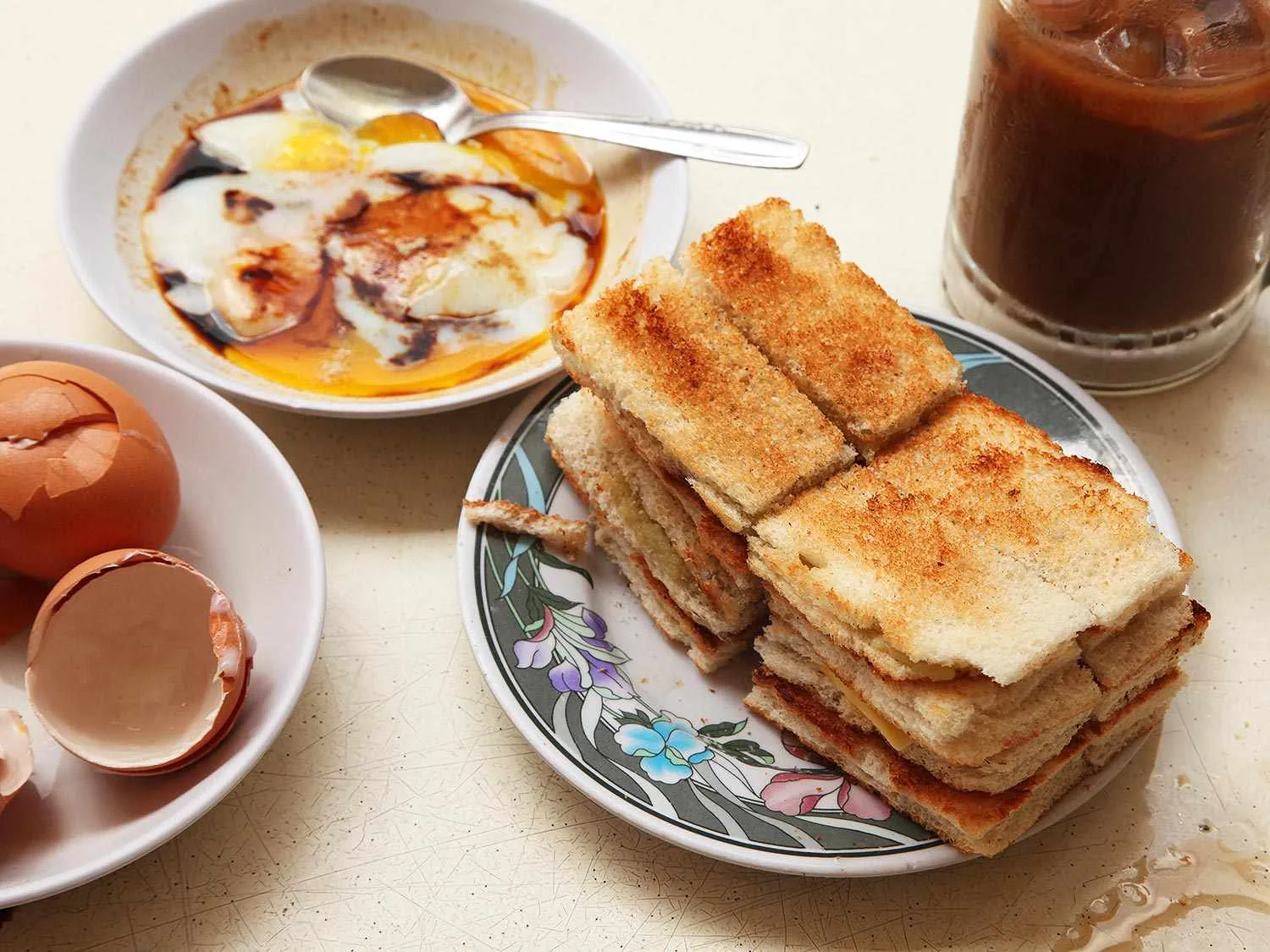 The classic set: kaya toast, soft-boiled eggs and kopi